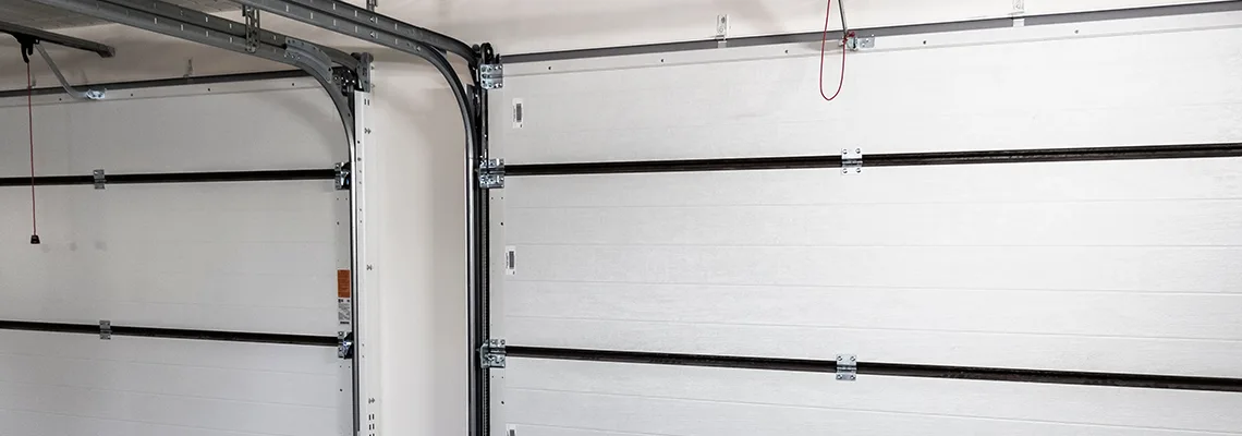 Fix Folding Garage Door Jerking in Coquitlam, British Columbia